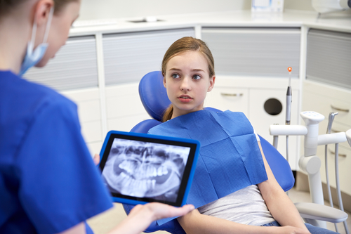 dentist showing xray