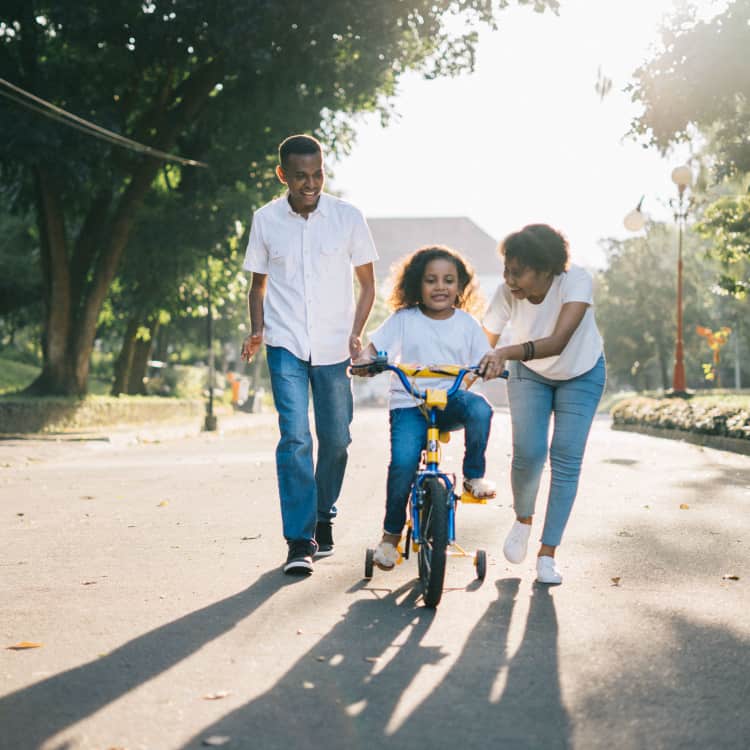 family riding a bike